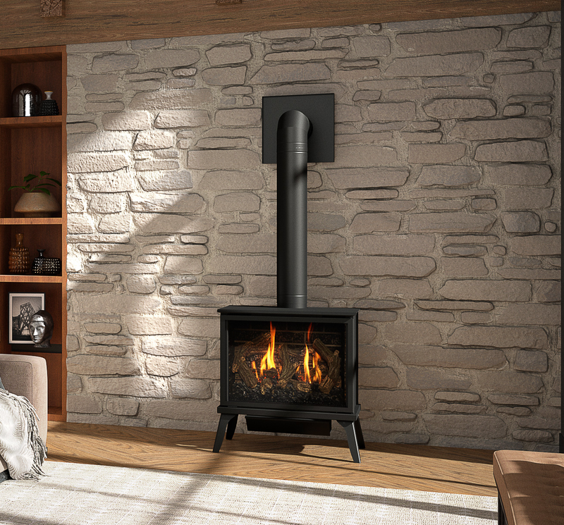 Kozy Heat Lakefield XL freestanding gas stove installed against a stone wall