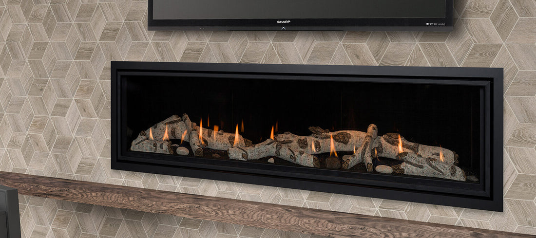 Kozy Heat Callaway 72 linear gas fireplace with birch media in a wood-accent room