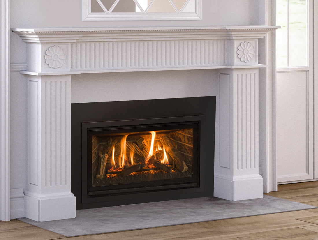 Kozy Heat Chaska 29 gas insert with rock media in a finished room