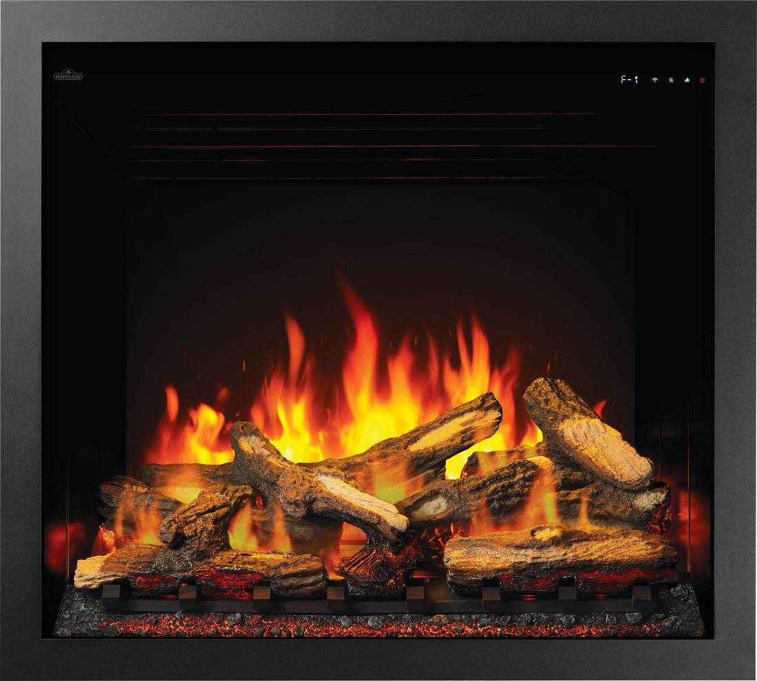 Straight-on traditional black built-in fireplace with split oak logs.
