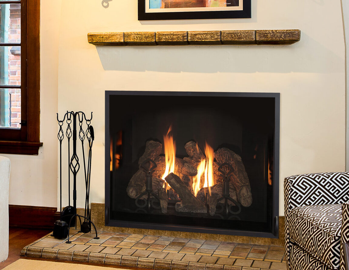Kozy Heat Alpha 36S direct-vent gas fireplace with traditional log presentation