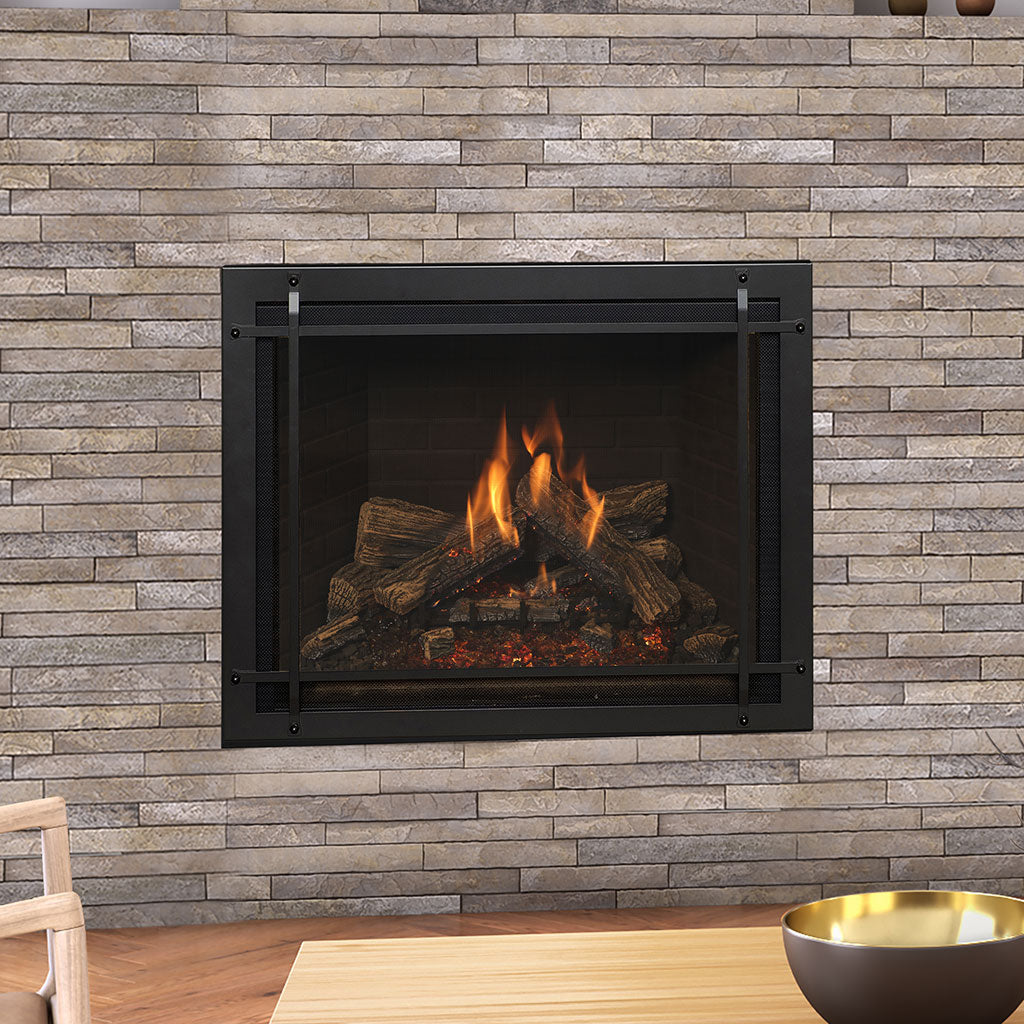 Kozy Heat Nordik 41DV gas fireplace installed in a stacked-stone wall