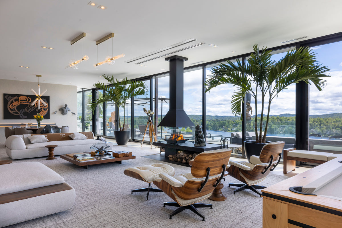 Don-Bar 9000 Series central wood fireplace in a panoramic lakeside residence