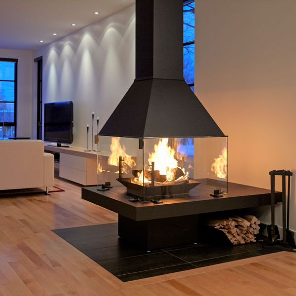 Modern fireplace with glass doors in a living room setting.