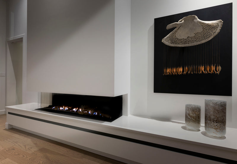 Ortal 170TS three-sided gas fireplace in a contemporary Rigaud interior