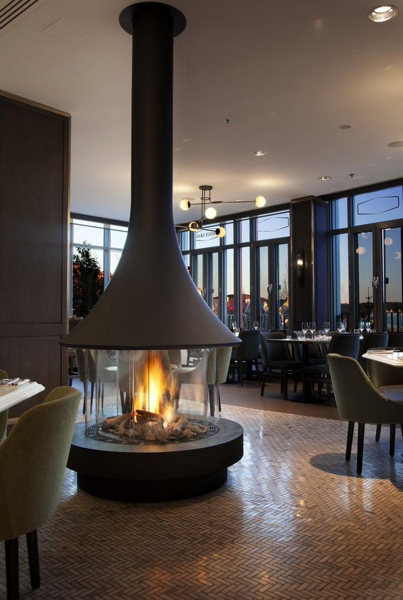 Circular Ortal fireplace installation at Fairmont Tremblant