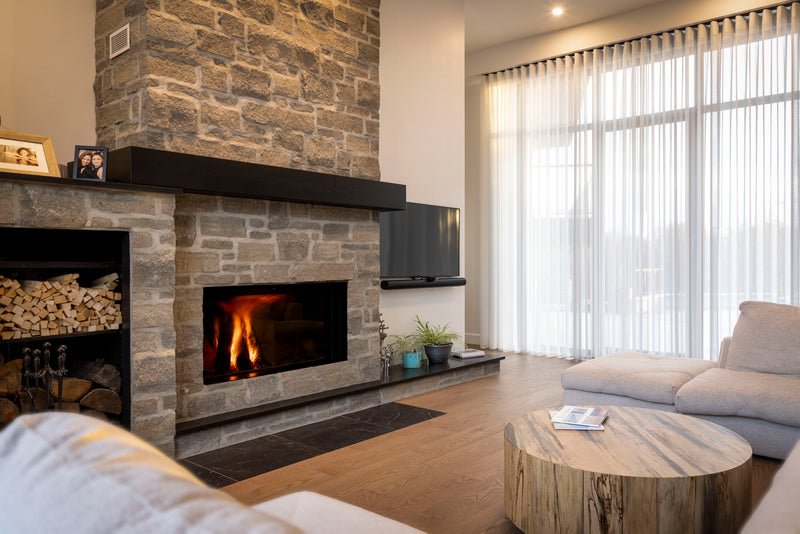Stûv 21-125 wood fireplace in a contemporary Rigaud living room