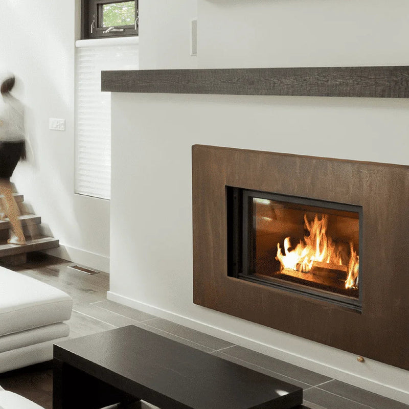 Modern living room with a fireplace and white walls